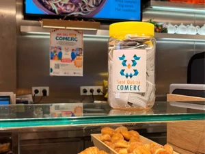 Cartell del Dia del Comerç 2026 a Sant Quirze amb promocions i descomptes als comerços locals